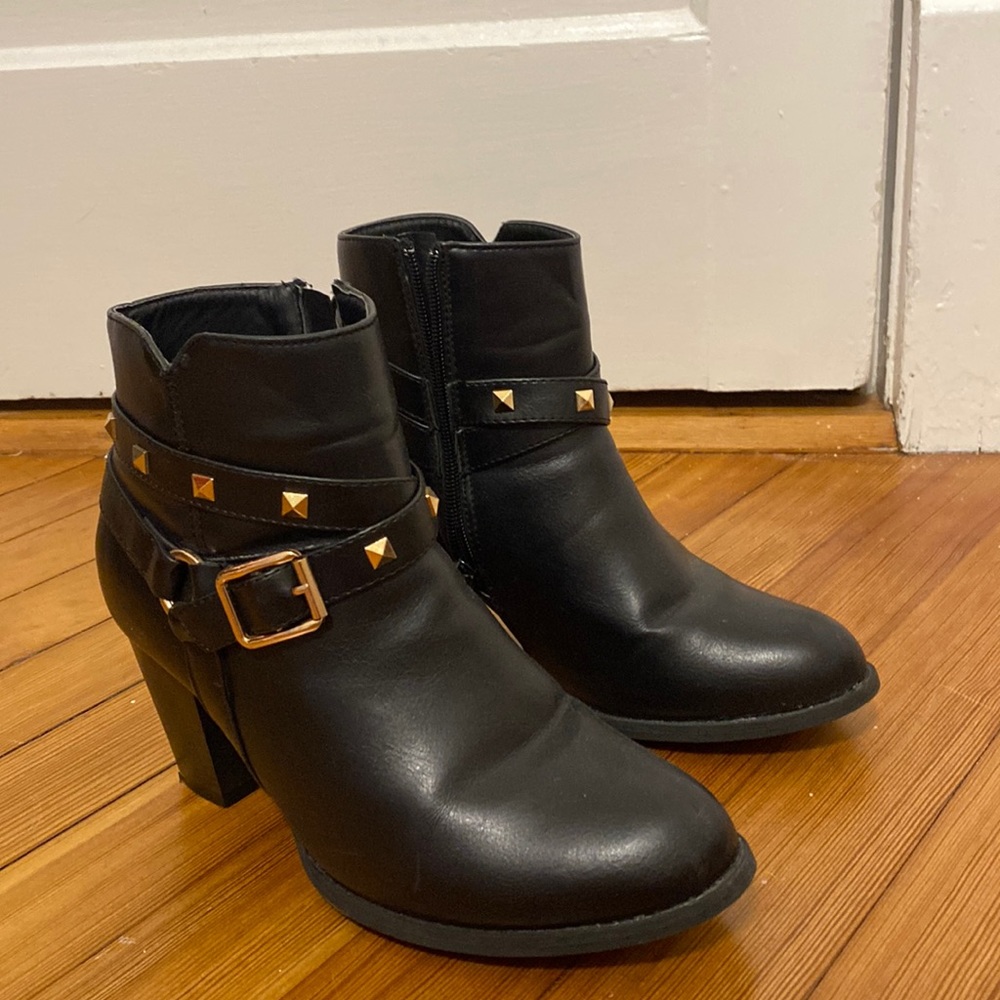 High heel boots with gold accents